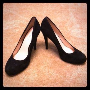 Black suede pumps